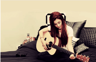Ari playing guitar