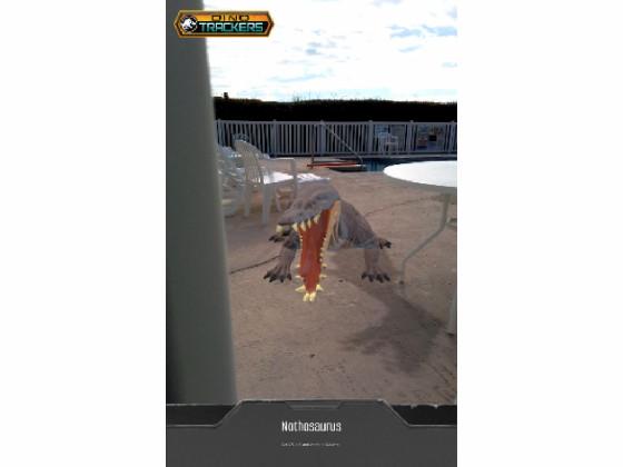 A dinosaur is at the pool
